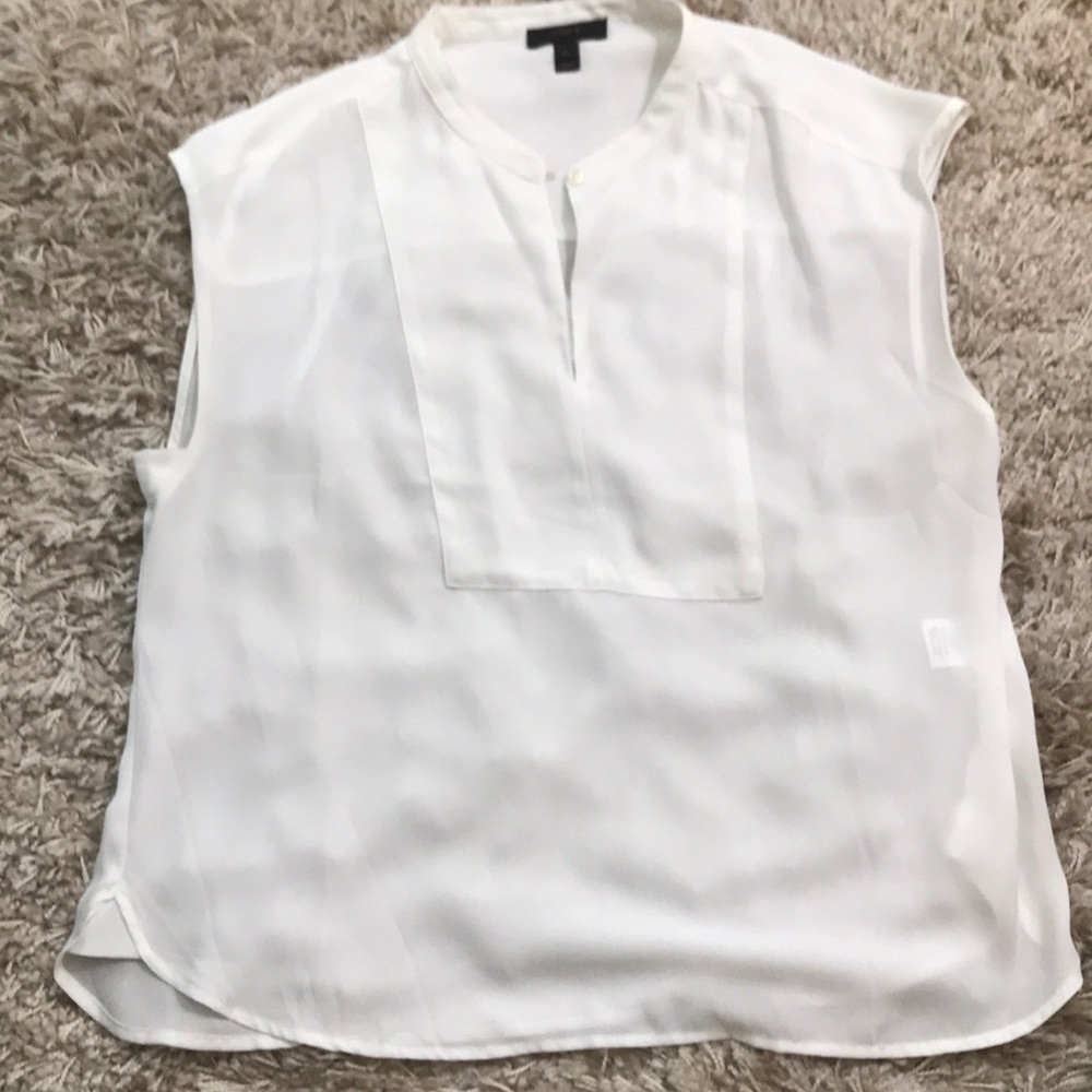 J crew petite blouse with a split neck and a button on top.